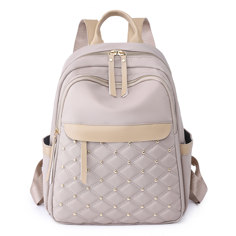 Bolsos para mujer 2023 nueva mochila de nailon para mujer coreana moda contraste color remache mochila de viaje mochila escolar en nombre del cabello