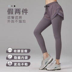 アウトドアサイクリング用フェイクツーピーススポーツパンツ レディース ハイウエスト ヒップアップ ランニング フィットネスパンツ シームレス ヌード感 ヨガパンツ 卸売