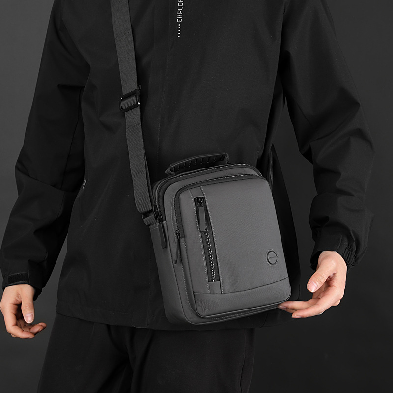 2024 nuevo bolso de hombre de gran capacidad de moda moda mochila de mano casual vertical simple mochila de viaje al por mayor