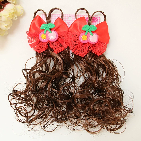 A pair of curly braided cherry reds