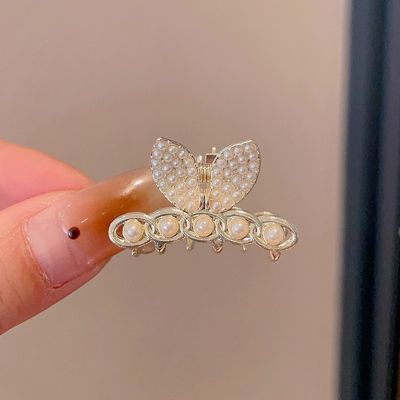 Nuevo medio lazo pelo pequeño clip simple tiburón clip accesorios para el cabello para las mujeres Pequeño clip de metal tamaño pequeño perla horquilla rota 2024