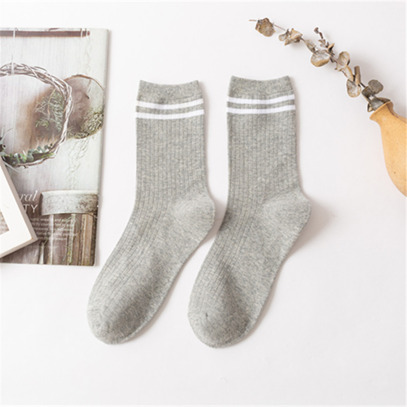 Otoño e Invierno rayas verticales calcetines de algodón de color sólido hombres y mujeres cordón media-pantorrilla longitud calcetines clásico casual cómodo calcetines de algodón peinado