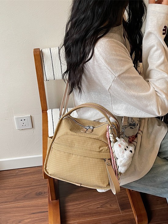 Casual ligero japonés versátil bolso de tela de nylon 2026 nueva moda de hombro mochila bolso de viaje