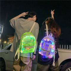 Ins風のカラフルな透明なリュックサックの女性の大衆はledカバンの男性のまぶしい街頭のリュックサックのPCの女性のカバンの潮を合わせます。