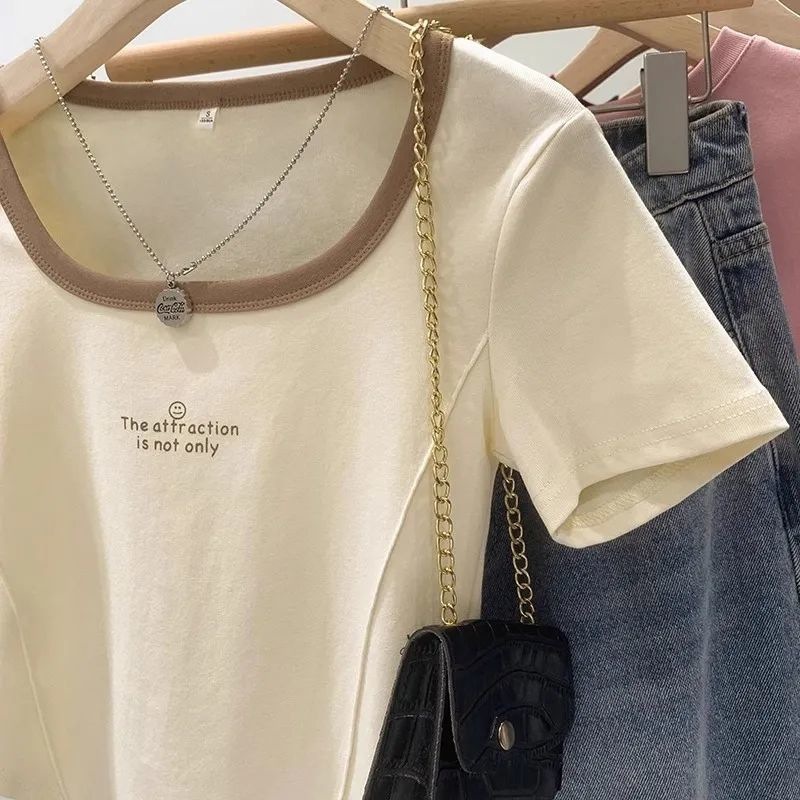 女性のための右肩薄い半袖 T シャツ夏 2025 カラーブロック純粋な欲望ホットガール痩身鎖骨コントラストカラーショートトップ|undefined