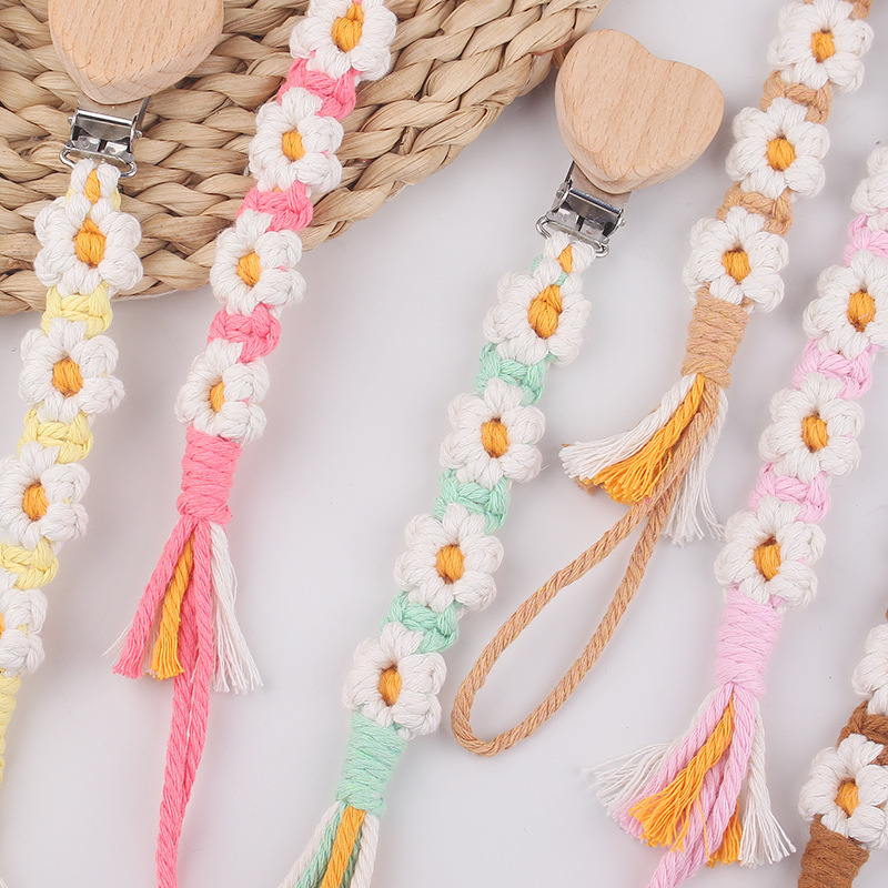Productos para bebés, clips de chupete de haya de amor de dibujos animados, cadena de chupete de cuerda de algodón de margarita tejida a mano creativa