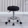 Black round stool (pulsating wheels)