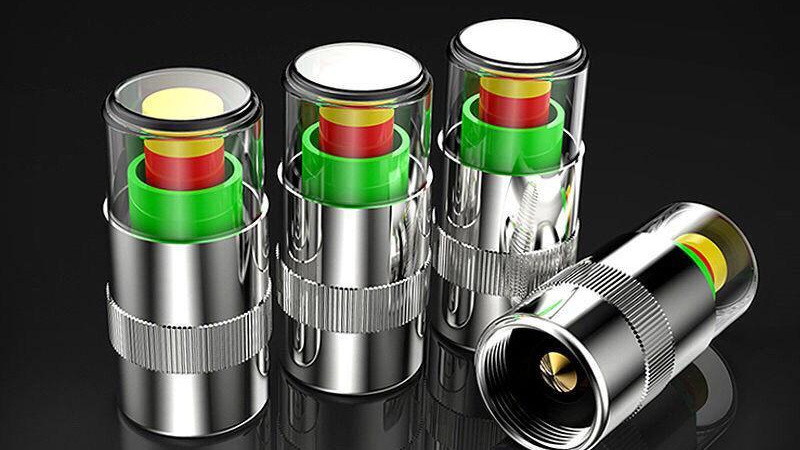 Tire pressure monitoring valve core with three-color warning for tire pressure monitoring