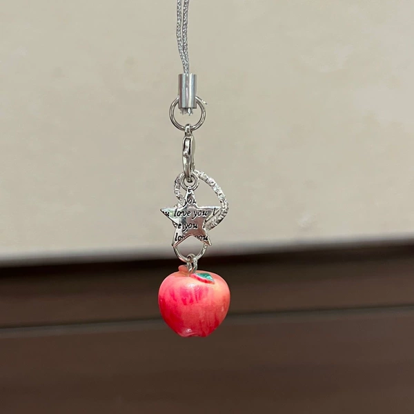 Apple, red pendant with letters