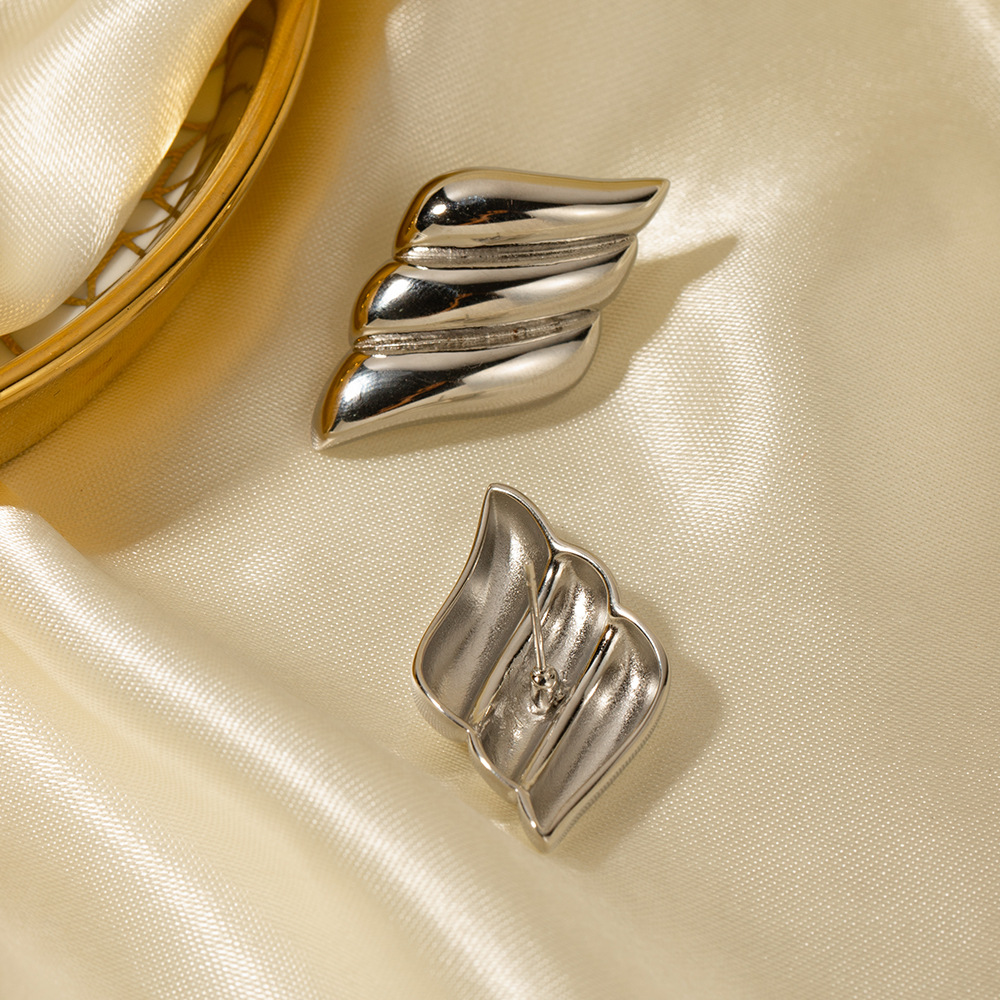 Europa y América 18K oro de acero inoxidable retro pendientes simples pendientes ins Internet celebridad de alto grado simples pendientes de acero de titanio pendientes