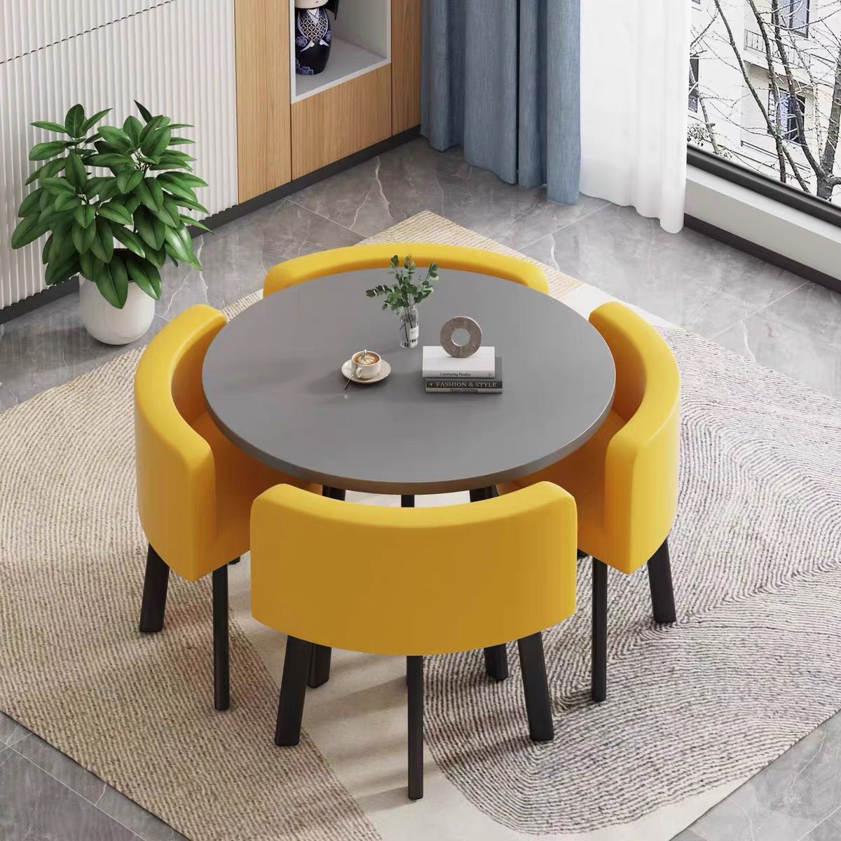 Gray round table + four yellow leather chairs