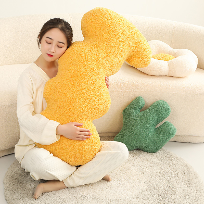 Nuevo estilo simple almohada de peluche floral almohada de peluche nudo donut almohada de cama almohada de cojín grande almohada al por mayor