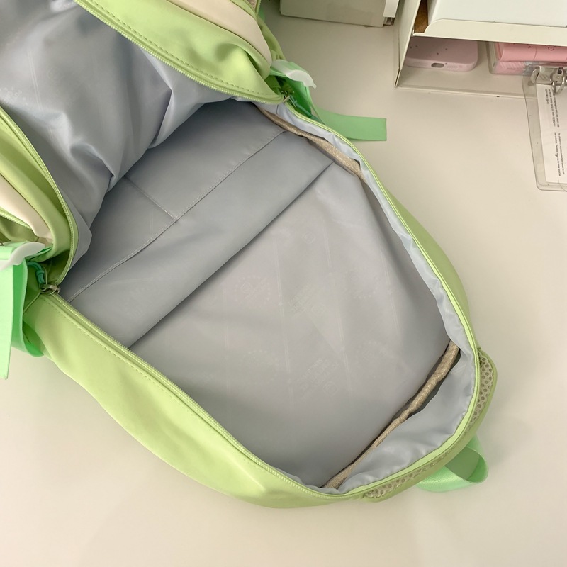 2024 nueva mochila escolar de gran capacidad de color de contraste impermeable para estudiantes universitarios de secundaria y preparatoria