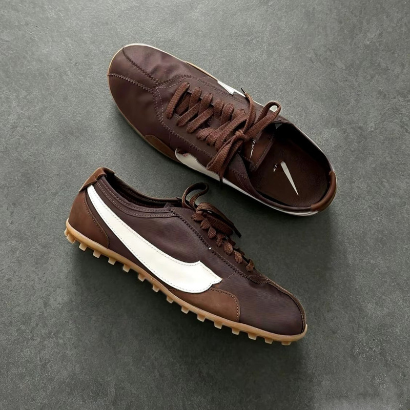 Moon Shoe is a lightweight, breathable waffle-patterned training shoe for men and women, featuring a retro and versatile design, inspired by the moon landing and Forrest Gump sneakers Moon Shoe is a lightweight, breathable waffle-patterned training shoe for men and women, featuring a retro and versatile design, inspired by the moon landing and Forrest Gump sneakers