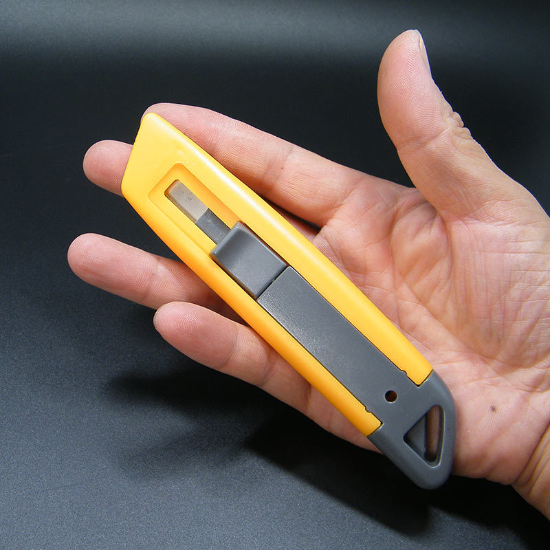 Cuchillo de apertura de caja de seguridad para desmontar artefactos mágicos de entrega rápida Cuchillo de seguridad de rebote automático Cuchillo de corte de papel corrugado Cuchillo trapezoidal