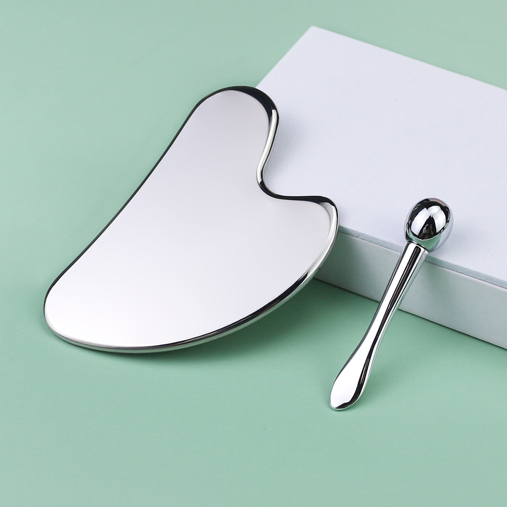 Cross-border especial para herramientas de belleza facial conjunto de corazón 304 acero inoxidable placa de masaje LM el mismo tipo de crema de ojos masaje varilla