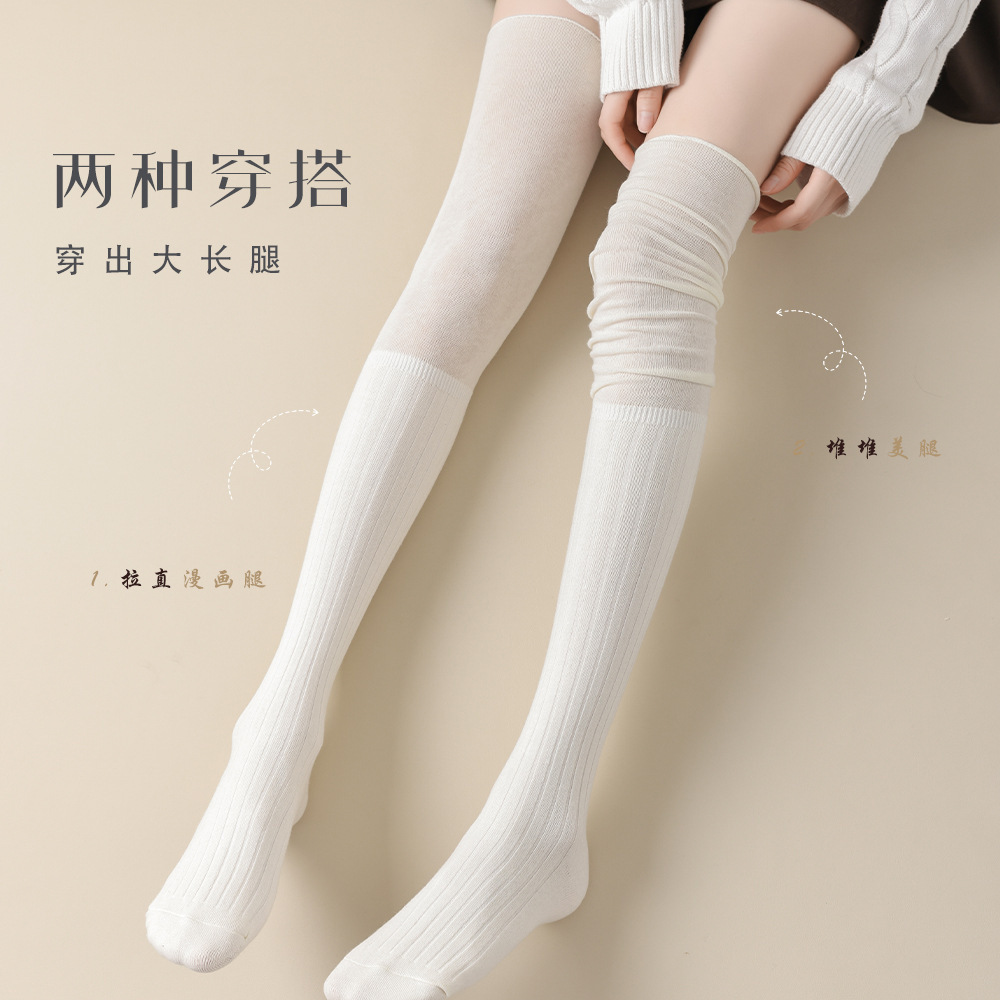 アングラの赤い櫛の綿の長い筒は膝の靴下の高い筒の純色のつなぎ合わせのinsの潮は妊婦の太ももの靴下に乗ります。