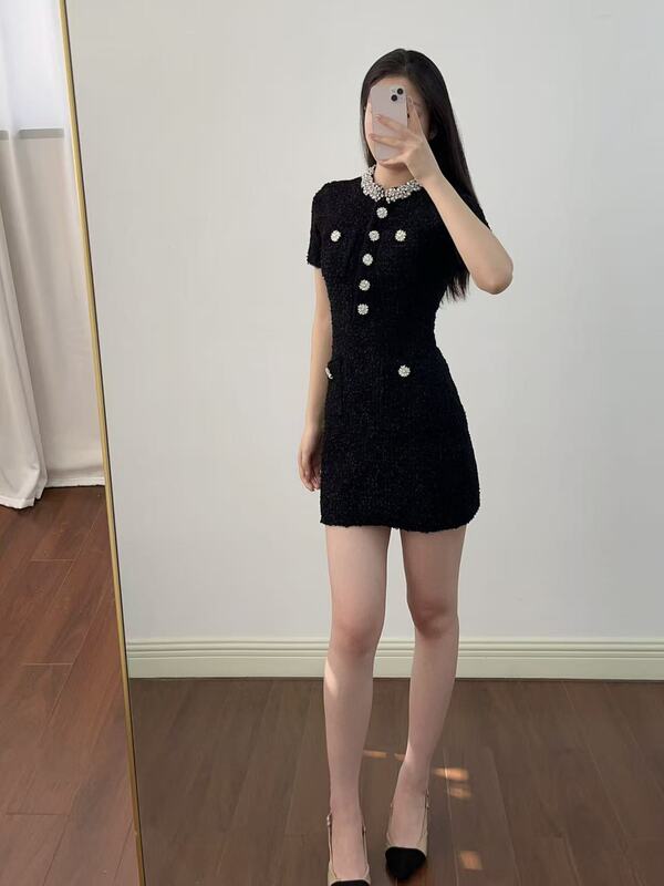 2025Sp Early Autumn Gentle Fragrance Black and White Diamond Round Neck Knitted Slim Short-Sleeved Dress 250256 2025Sp Early Autumn Gentle Fragrance Black and White Diamond Round Neck Knitted Slim Short-Sleeved Dress 250256