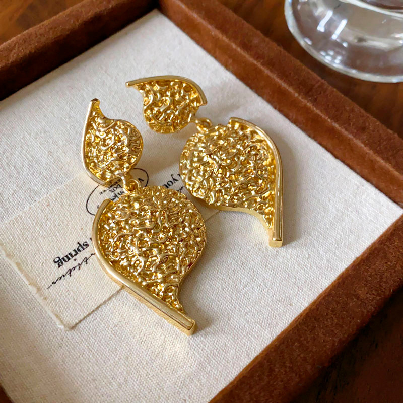 Aguja de plata MEDIADOS DE-antigua flor redonda borla pendientes de metal retro europeo y americano elegante luz pendientes de lujo al por mayor para las mujeres