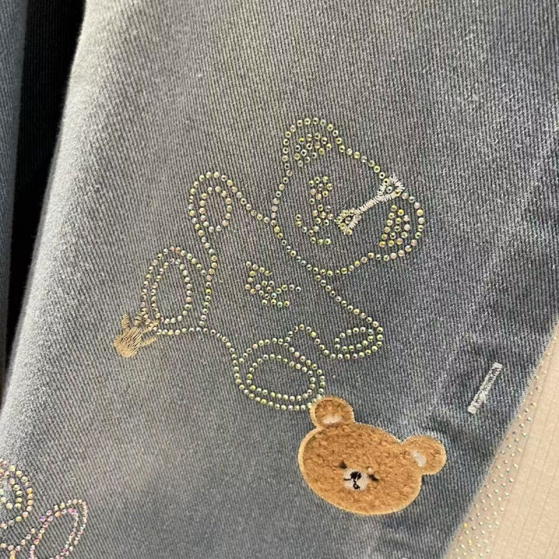 Solapa diamante caliente versión suelta de la chaqueta vaquero de oso grande temporada 2026 estilo extranjero ocio manga larga con camisa de mujer
