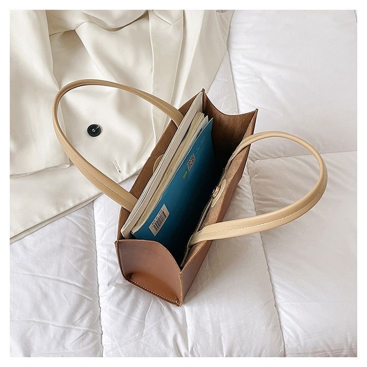 2024 New Bags Korean Version Versatile Commuting Bags Large Capacity Portable Tote Bag Temperament Popular Women’s Bag Vertical Style_voghion.com