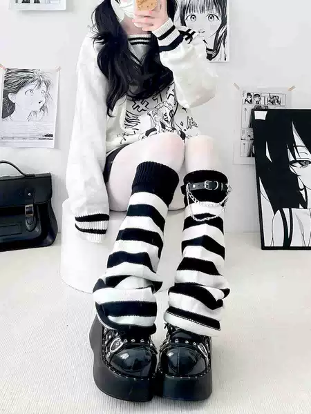 Black and white speakers + a black leather buckle