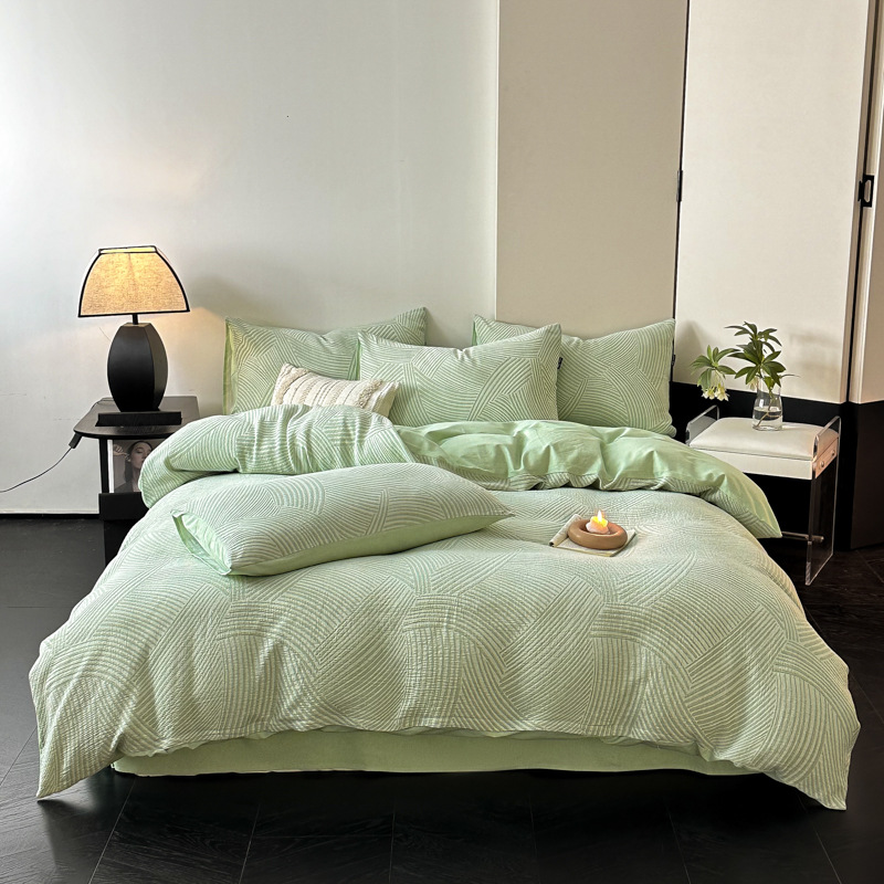 Una clase de madres y bebés de algodón molido cuatro piezas Nantong ropa de cama textil de algodón sábanas de cama cuatro piezas