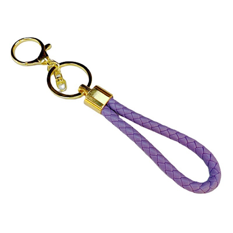 Ronda de la langosta hebilla PU cuero trenzado cuerda llavero hombres y mujeres amor llavero mano cuerda bolsa cordón fábrica directa al por mayor