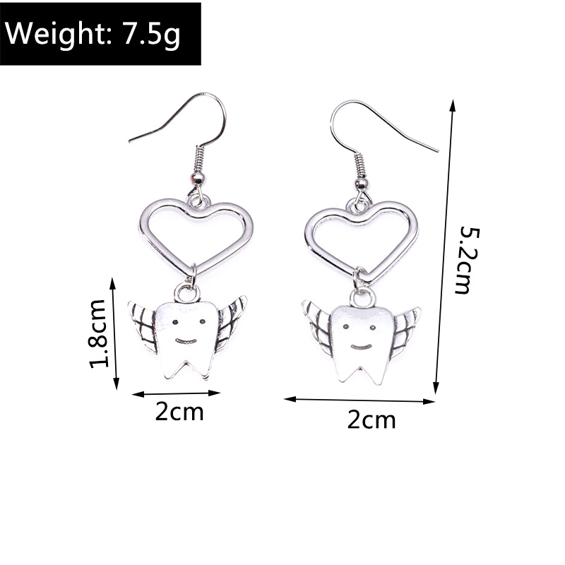 Boucles Oreilles De Dents De Dessin Animé Simples En Forme De Coeur De Bijoux De Mode display picture 1