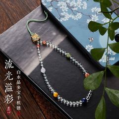白水晶多宝の携帯チェーンは手作業で編みます。