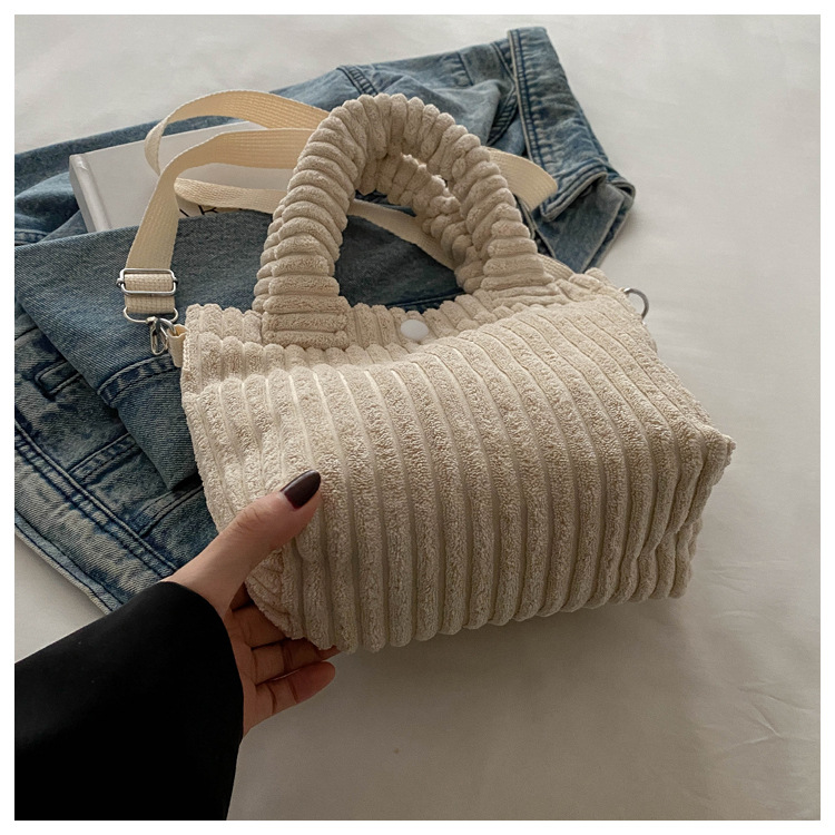 2025 New niche and fresh bucket bag, cute, fashionable and casual crossbody bag, versatile solid color handbag wholesale undefined
