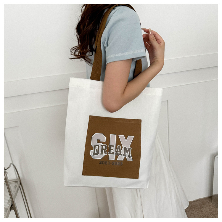 Wholesale of 2025 new casual and fashionable canvas bags, large-capacity single-shoulder bags for college students' shopping, and trendy tote bags undefined