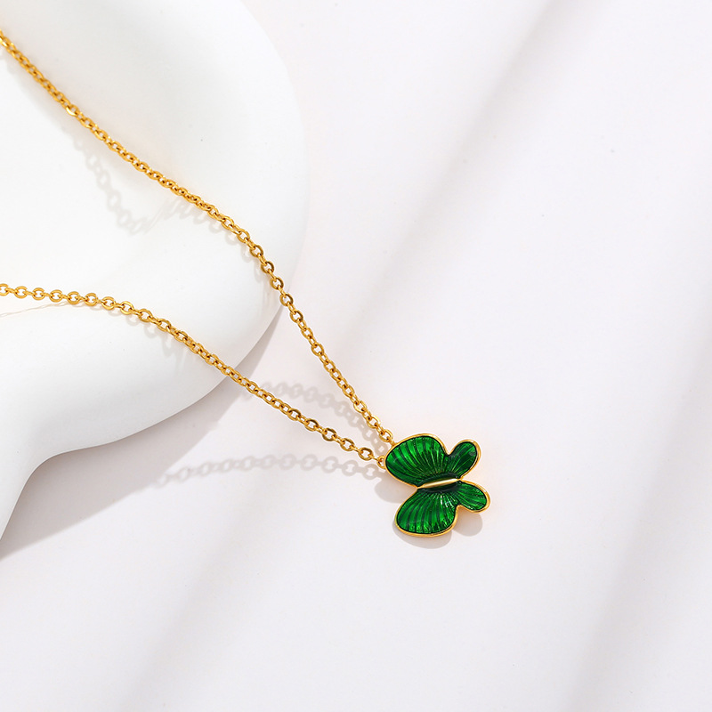 Joyería de xupe colorido esmalte gota aceite mariposa colgante temperamento femenino Corea del Sur simple nicho colgante de verano joyería