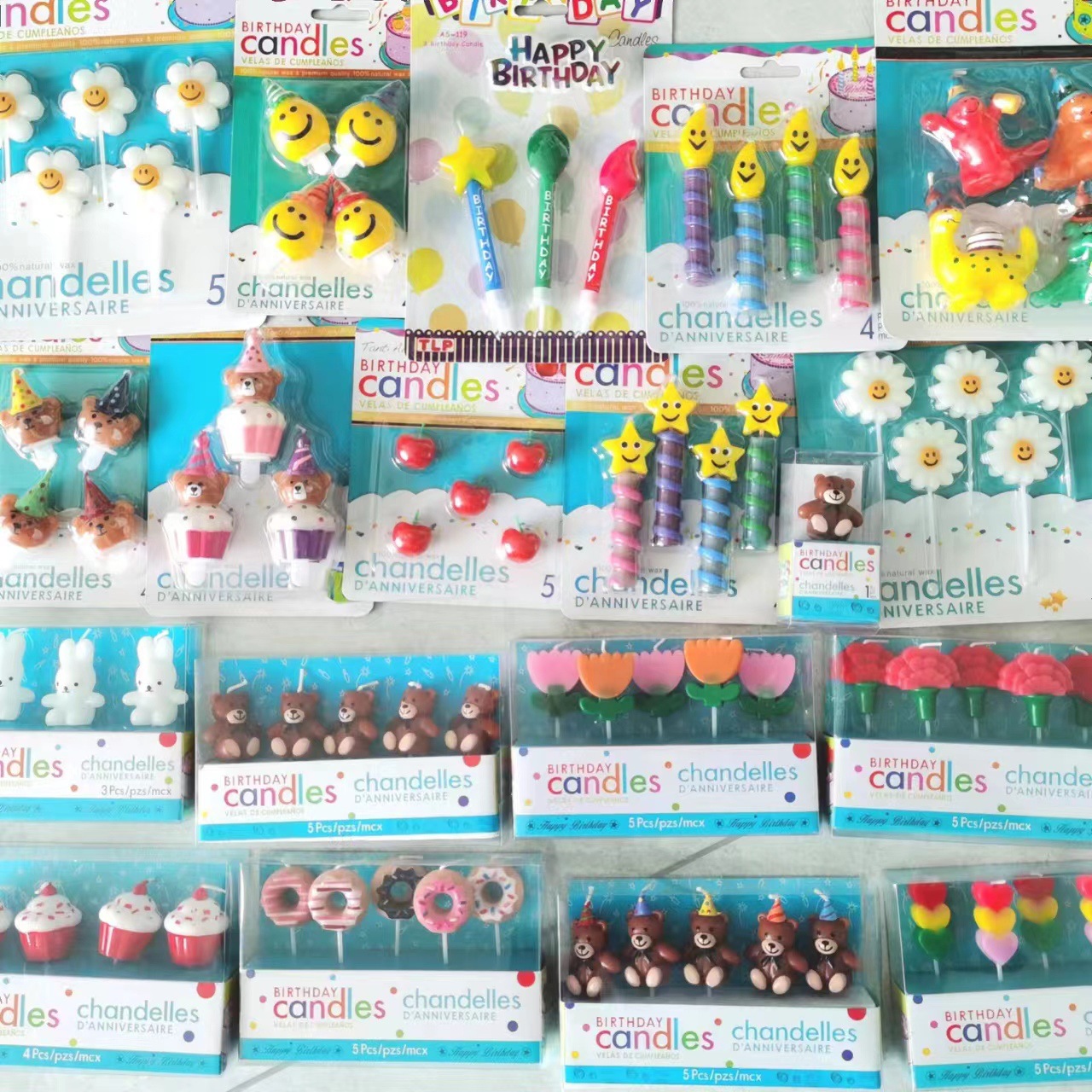 Vela de cumpleaños de dibujos animados al por mayor popular fiesta de flores oso dinosaurio donut cara sonriente vela de pastel para niños