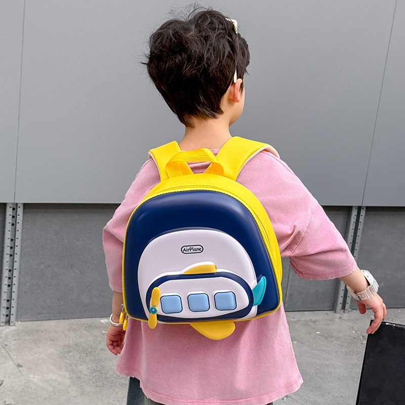 Jardín de infantes mochila para bebés lindo pequeño avión ligero cáscara de huevo mochila para niños y niñas nueva mochila infantil transfronteriza