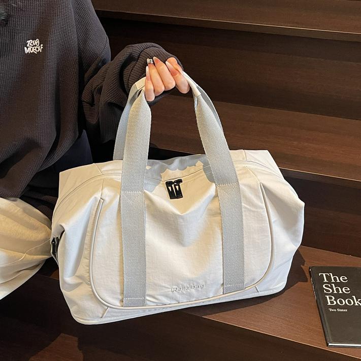 Bolso de viaje portátil coreano transfronterizo nuevo bolso de gimnasio ligero de gran capacidad bolso de viaje de viaje simple de ocio