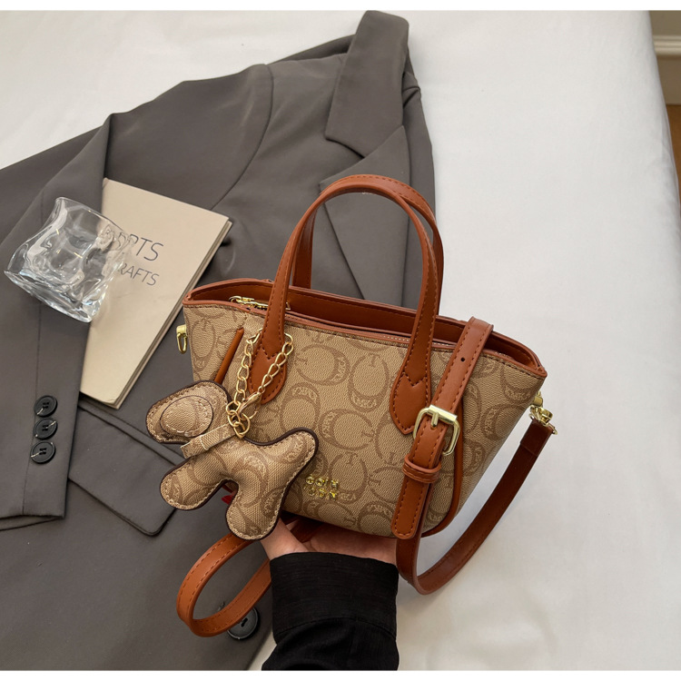 A high-end retro printed bucket bag for summer 2025, a trendy and versatile crossbody bag for women undefined