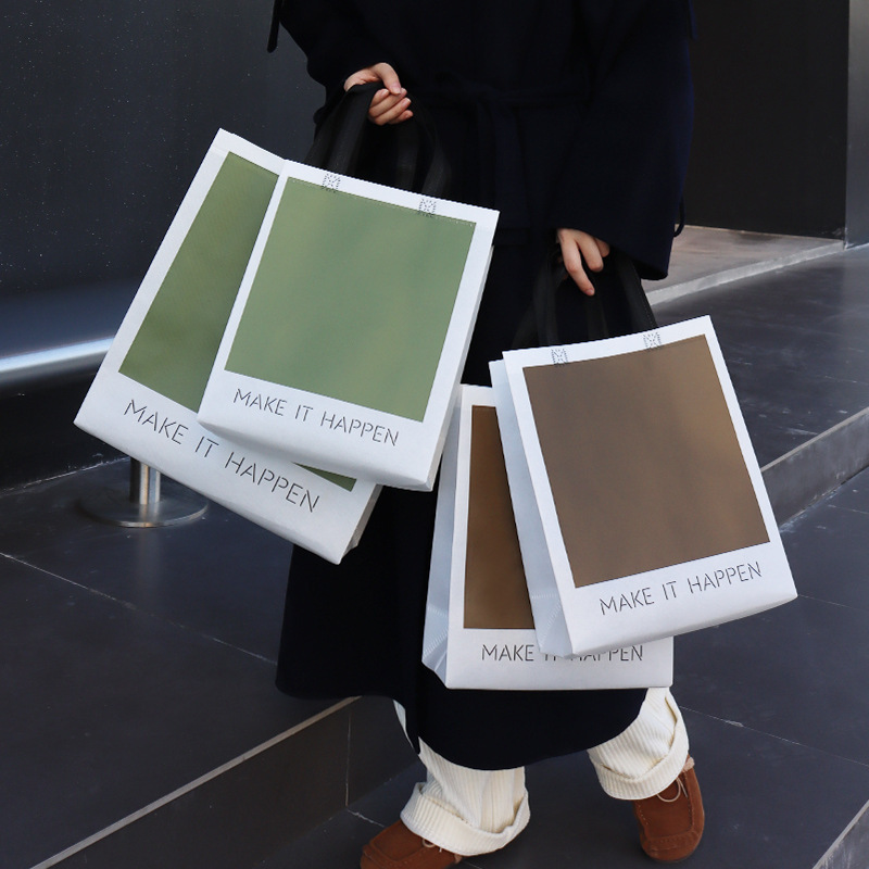 Simple Non-woven Handbag High-end Gift Packaging Gift Hand Carrying Clothing Store Clothes Shopping Fashion Simple Non-woven Handbag High-end Gift Packaging Gift Hand Carrying Clothing Store Clothes Shopping Fashion
