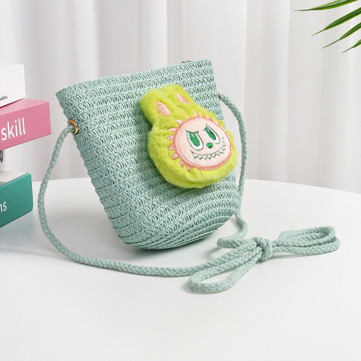 Cartoon adorable mochila de tela de tela de tela infantil hecha a mano creativa tejida de paja transpirable mini niñas mochila de tramo oblicuo