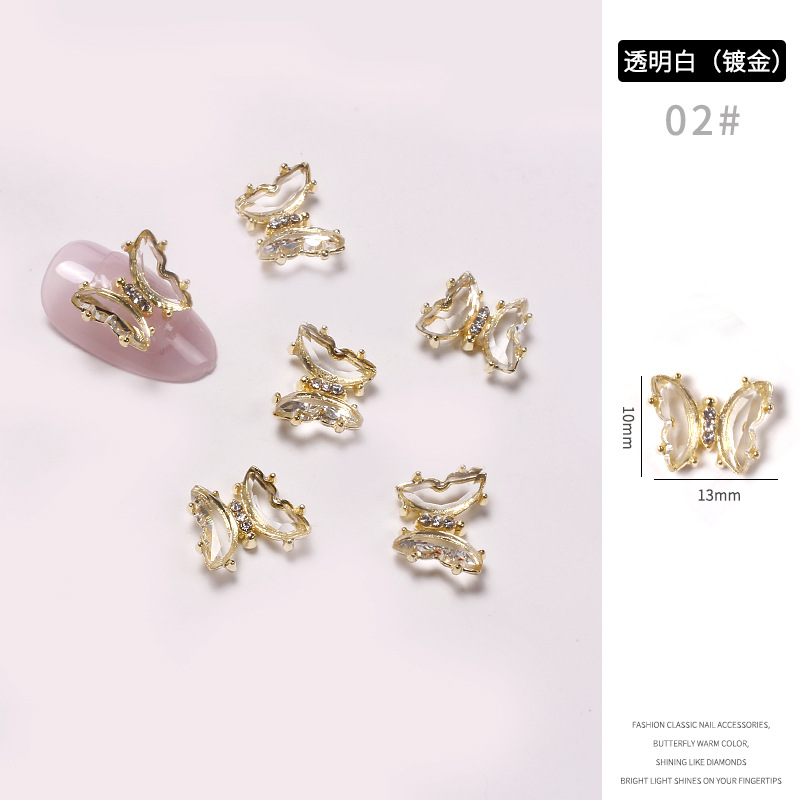 Red famosa nueva mariposa perforación joyas de manicura aleación tridimensional mariposa cristal permeación de hielo insins viento cristal mariposa perforación