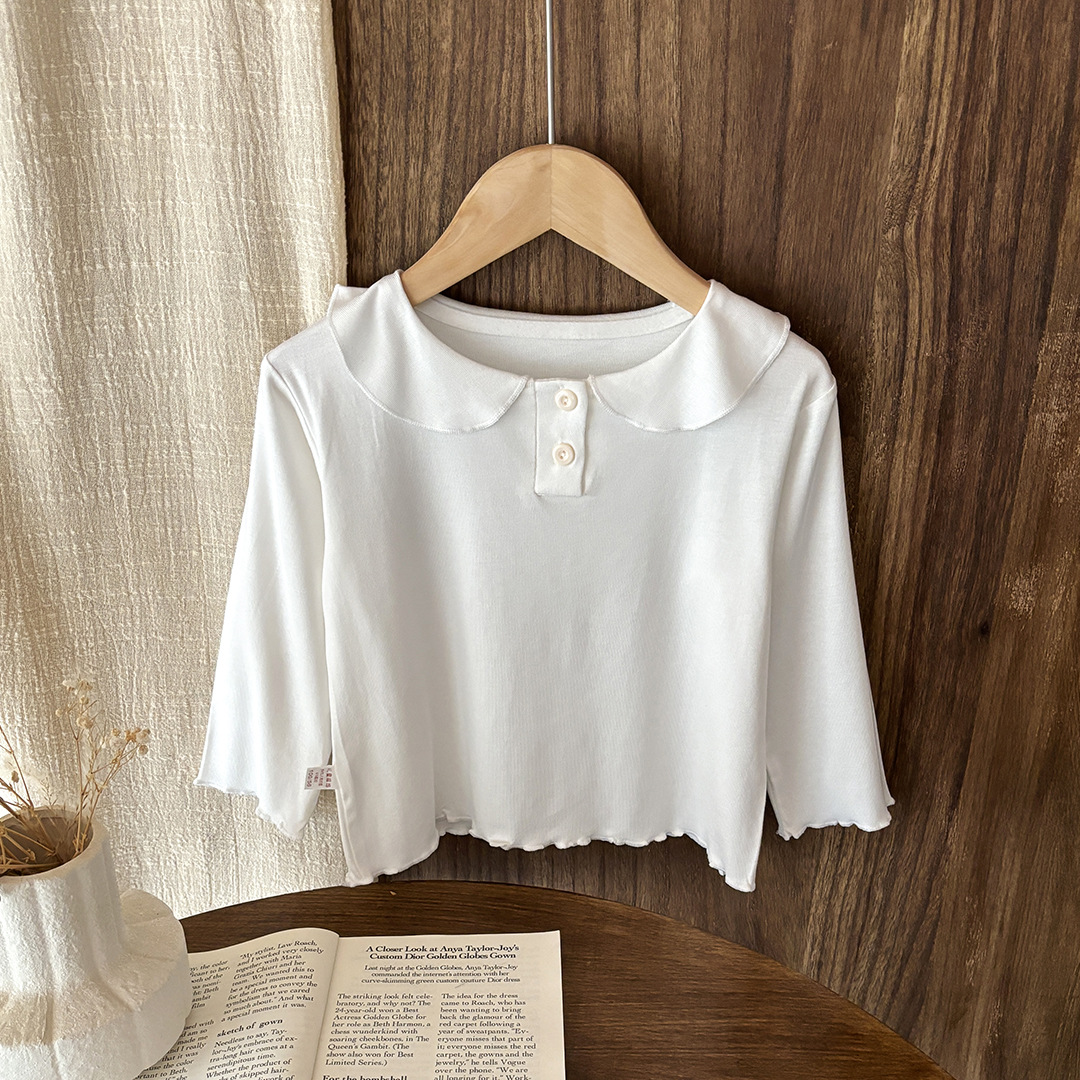 Camiseta de base para niñas delgada estilo extranjero 2025 primavera y otoño nuevo bebé femenino en una sola camiseta de manga larga con solapa de lana 6 años de edad