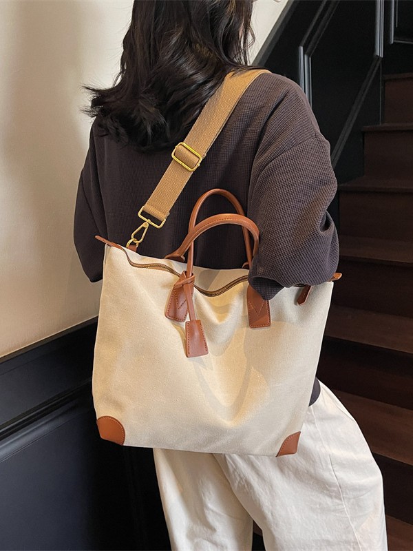 Bolso Tote a juego de color de lona nuevo transfronterizo para mujer 2025 bolso de mensajero de viaje de ocio de gran capacidad retro