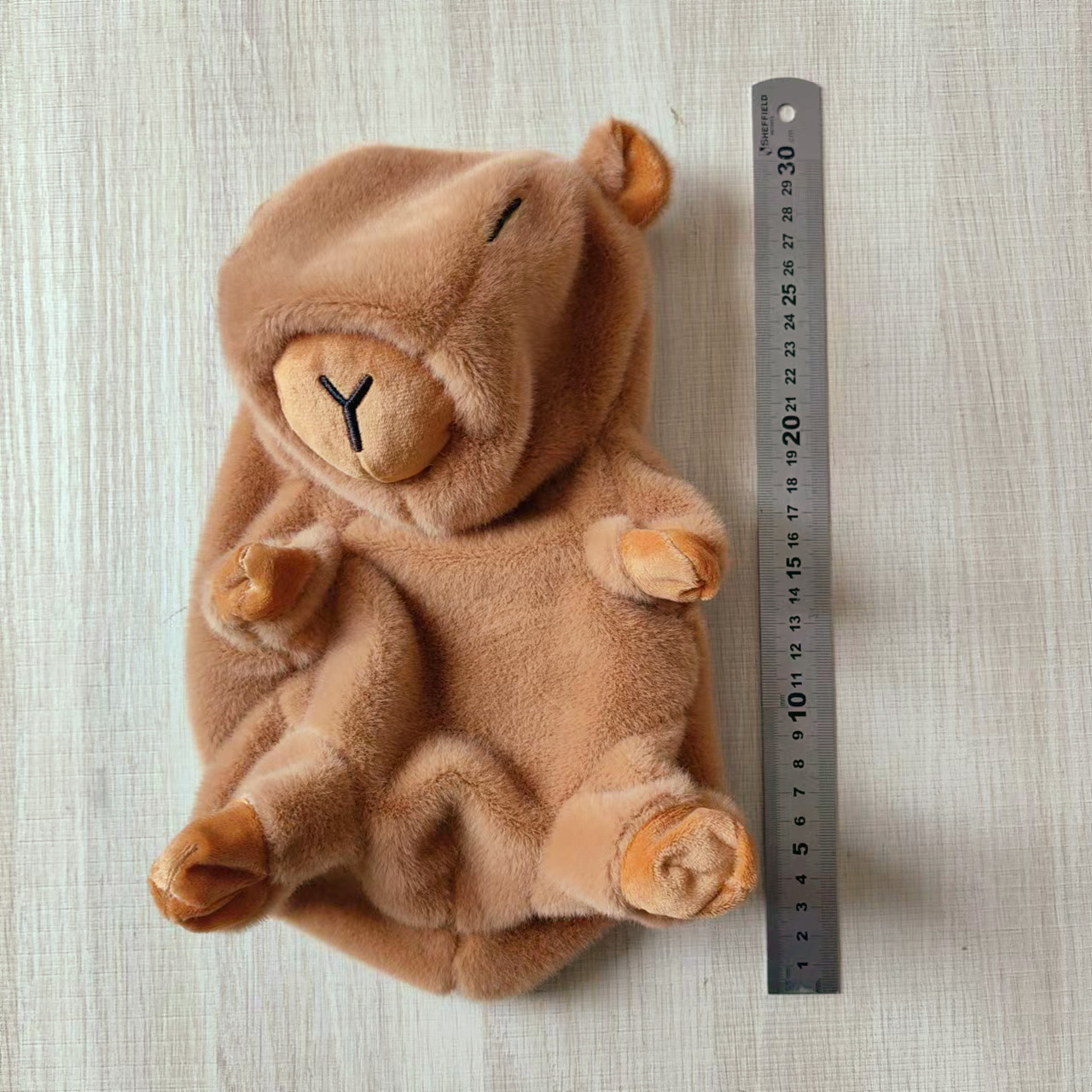 Fábrica directa de juguetes de peluche, cubierta de cuero, cubierta de cuero semiacabada, muñecas sin relleno transfronterizas en el extranjero