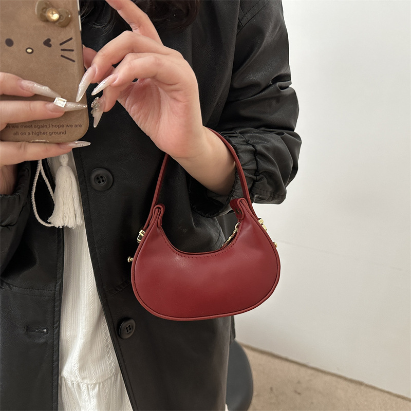 2025 primavera y verano nuevo estilo estampado de leopardo marea bolso de media luna moda estilo occidental textura bolso personalizado estilo ins mini bolso