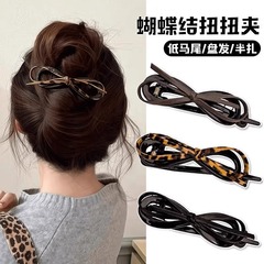 气质皮质蝴蝶结发夹一字夹女新款高级感豹纹扭扭夹后脑勺夹子