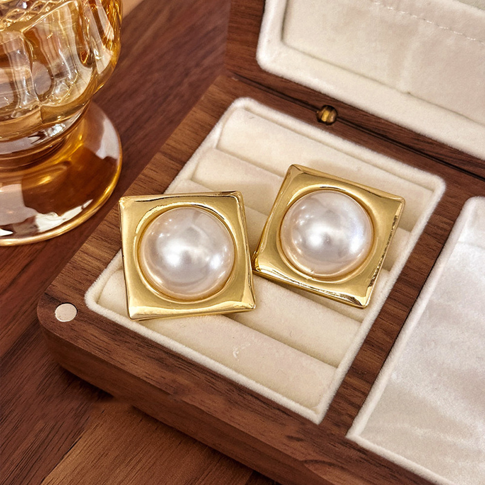 Pendientes de perlas grandes cuadrados simples con aguja de plata Pendientes de diseño exagerado de personalidad femenina Pendientes elegantes de alta gama al por mayor