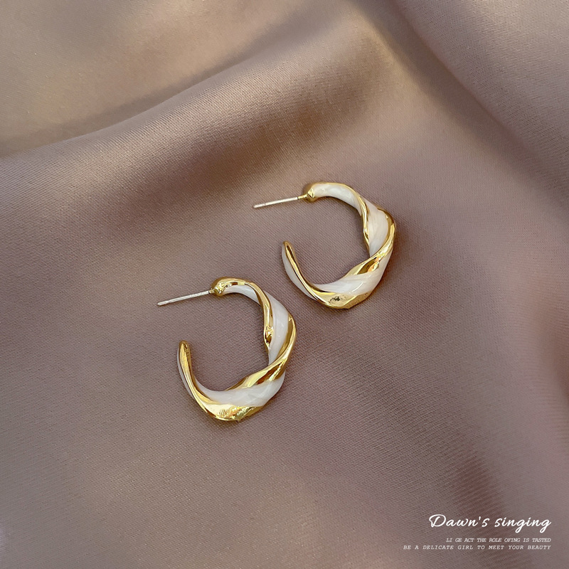 Korean New Retro Earrings Female Simple Personality Twisted Glaze Ring Earrings Wholesale display picture 4