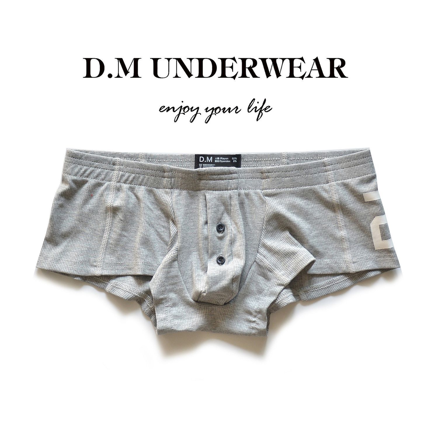 D.M男の下着のセクシーな純色のモーダル人の綿の平角の四角のズボンのボタンの激凸の袋のアルファベットの20ねじ