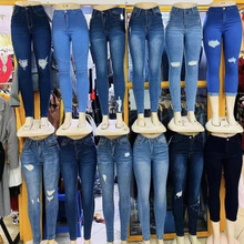 Tight fitting women's jeans 女士弹力小脚裤破洞牛仔裤现货批发