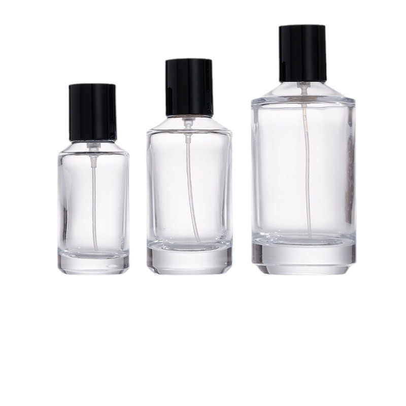 Botella de dispensación de perfume Juego de botella de spray de presión cosmética Botella de perfume de vidrio transparente 30/50/100ml